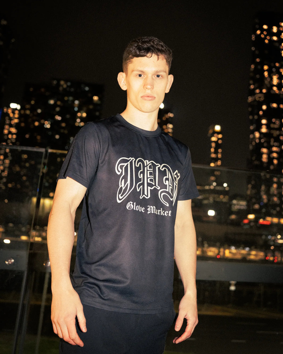 Harry, co-founder of JPN Professional, in a JPN Glove Market tee