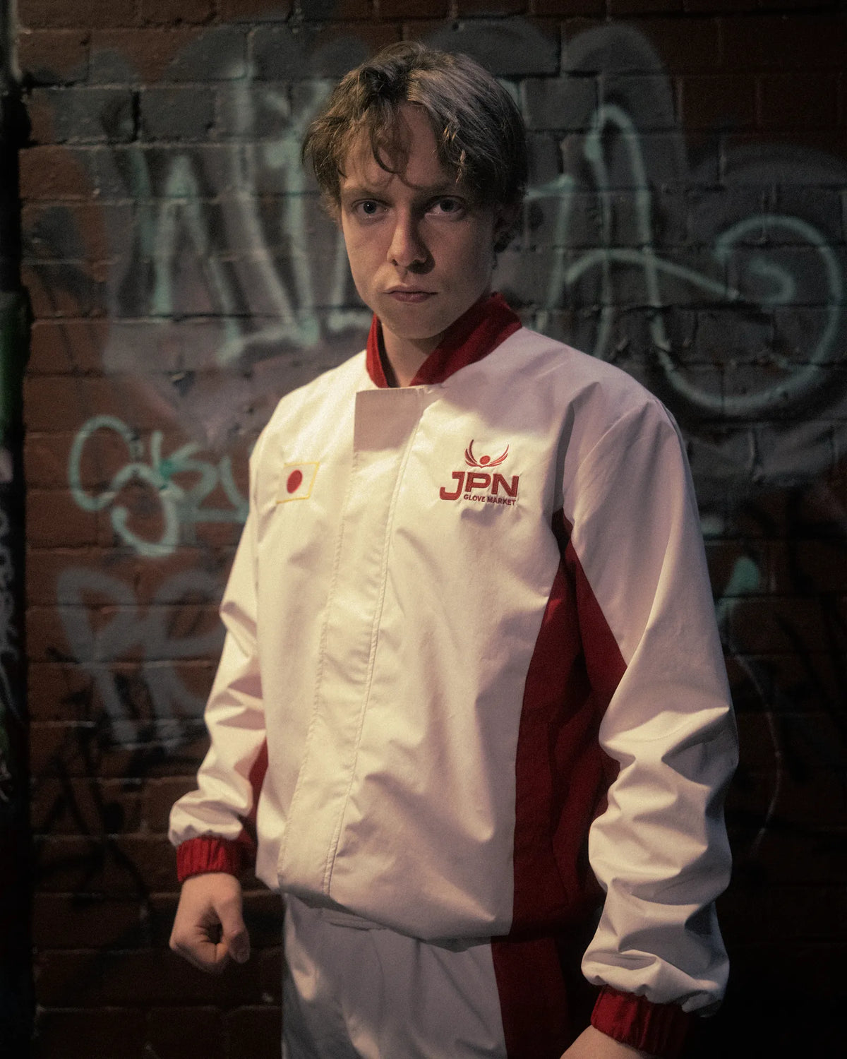 Liam, co-founder of JPN Professional, in the Team Japan track jacket
