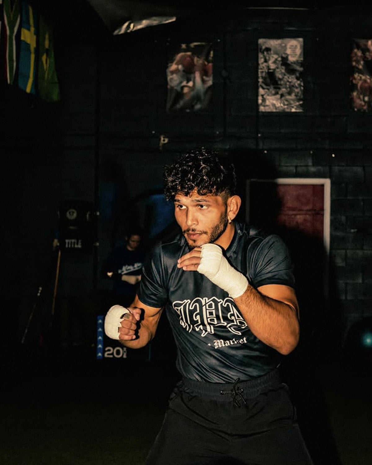 Danny Silva training in hand wraps and a JPN tee