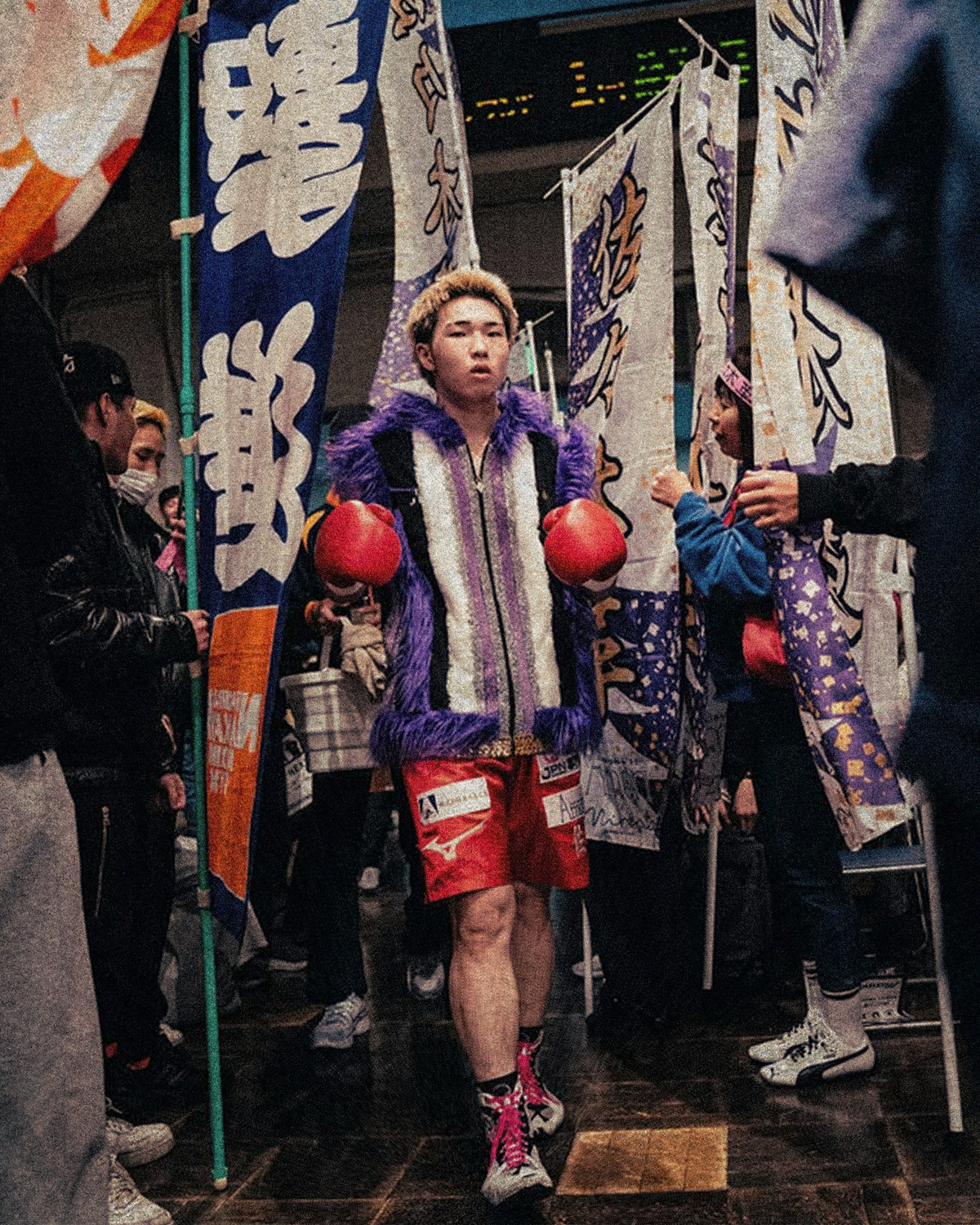 JPN fighter walking to the ring through fan banners