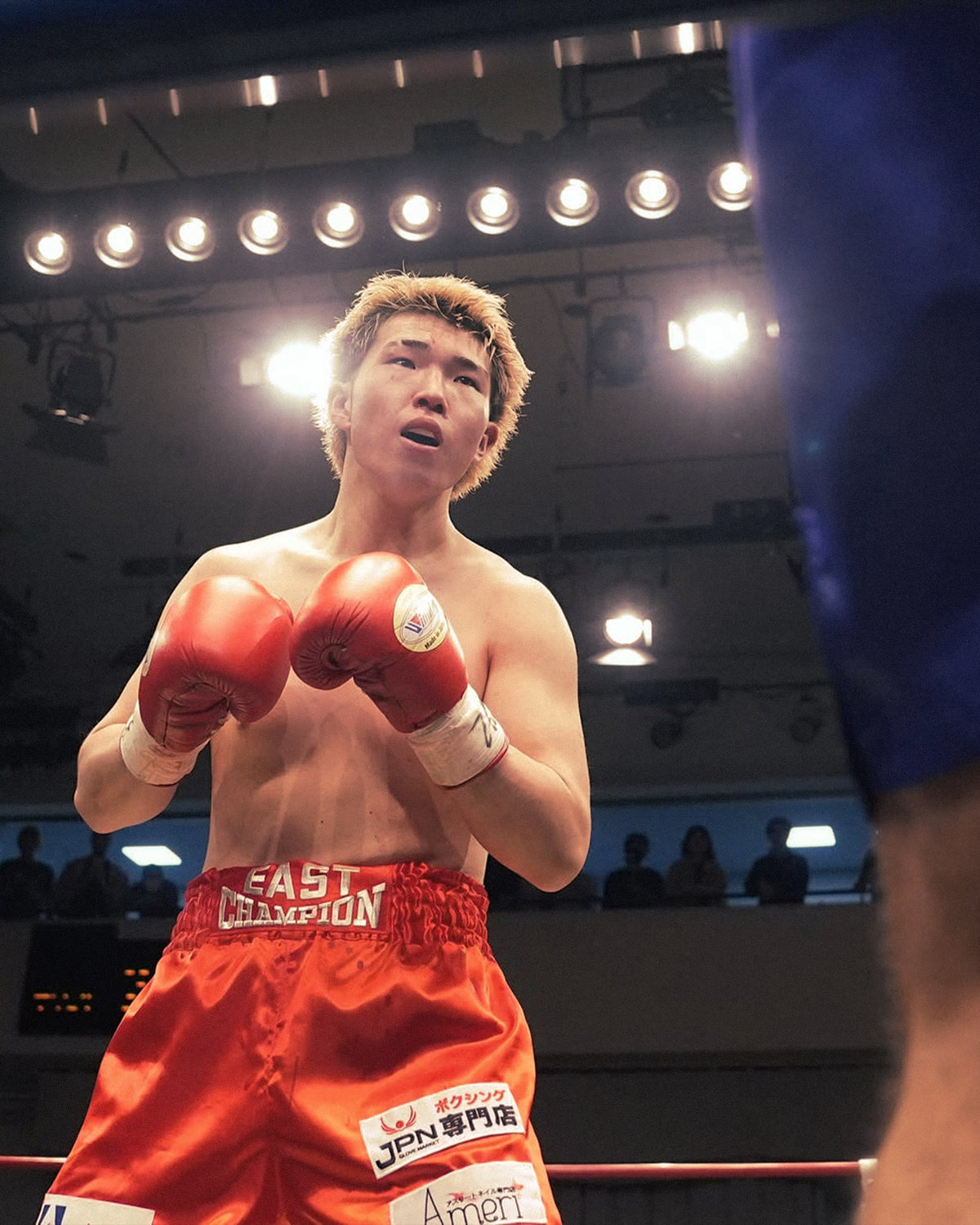 JPN fighter in the ring with JPN on his trunks